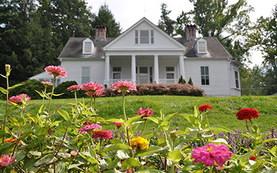 carl sandburg home national historic site with flowers in front